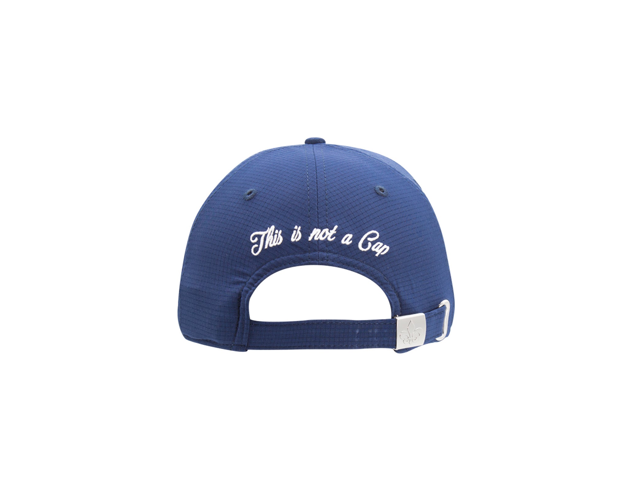 Dos casquette nylon sport bleu marine LXH, broderie cursive blanche This is not a Cap, passant métal fleur de lys.